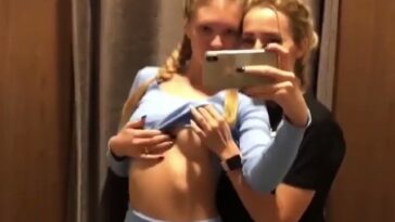 Two girls and tits in the dressing room
