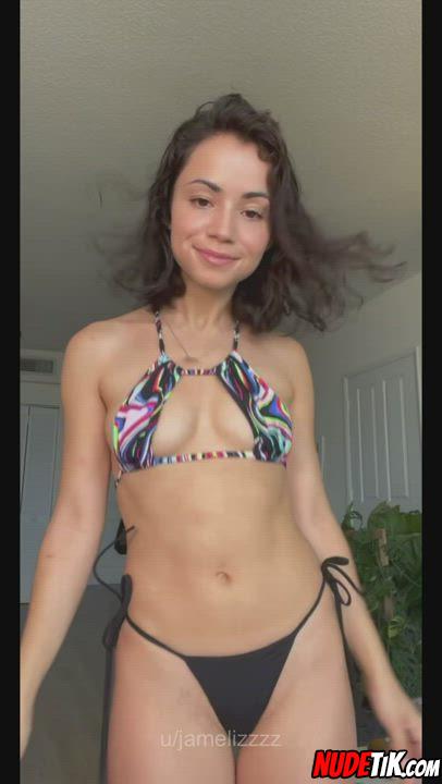 American petite girl shows a new swimsuit